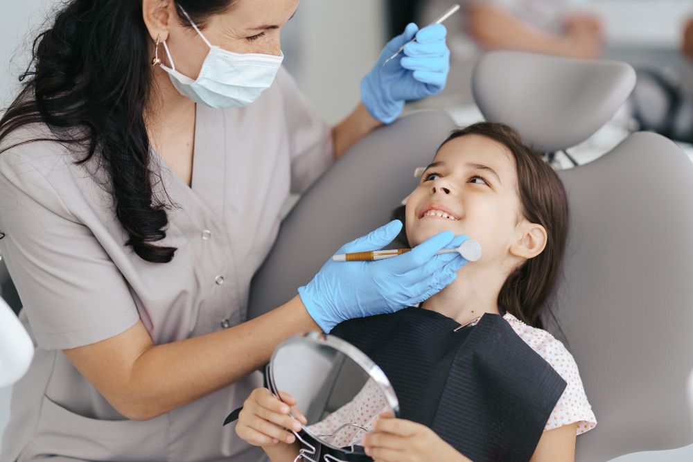 Com que frequência devo ir ao dentista?